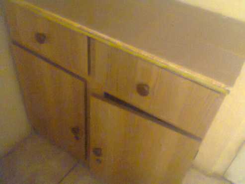 fresh and neat as new. hardly used cupboard for sale .