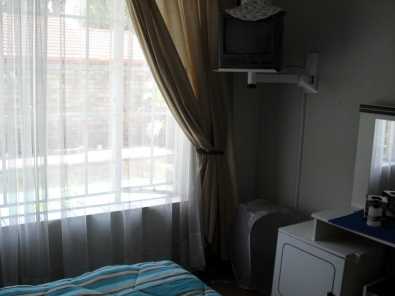 Furnished room to rent in upmarket private house.