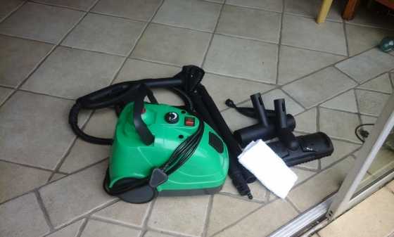 Genesis total home steaming system with accessories. Disinfects and kills bacteria for floors,