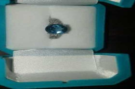 Genuine  Brand New Solid Wite Gold London Topaz ring with small diamonds