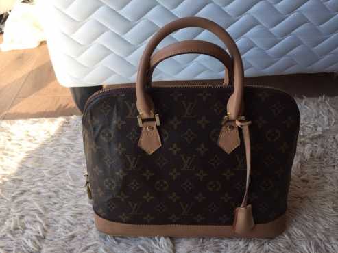 Genuine Louis Vuitton Handbag.