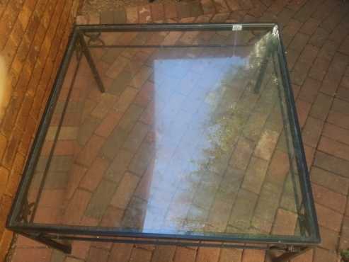 Glass and metal coffee table