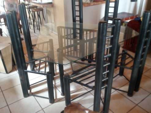 Glass top steel frame and chairs