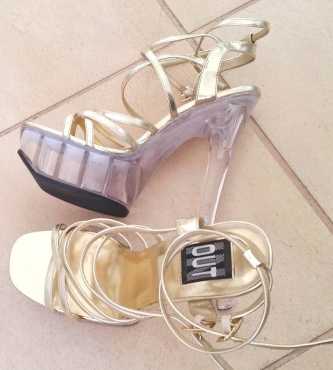 Gold strappy evening platformsfitness posing shoes