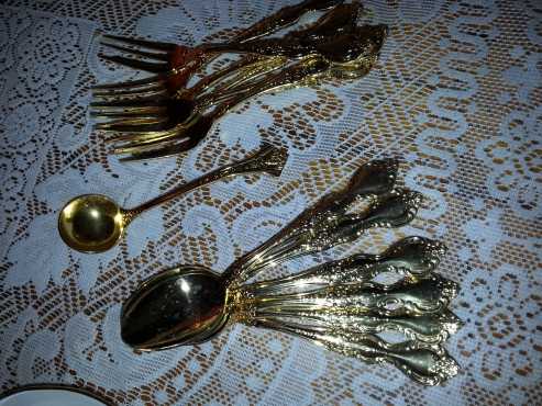 Gold teaspoons and cake forks for sale