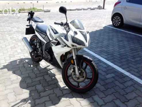 Gomoto ZR200 motorcycle for sale.Black and white in colour.