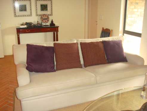 Good condition extra long 5 seater with cushions, collect in kyalami