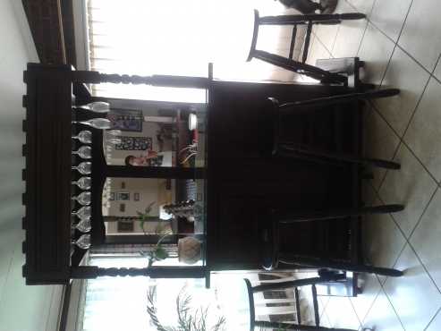 Good solid wood bar with 4 chairs still new