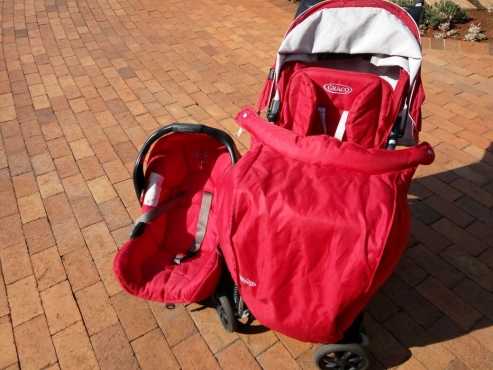 GRACO Travel System pram with travel seat and leg cover.