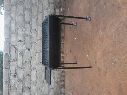 Half drum braaistand for sale at a good price.