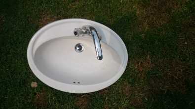 Hand basin and mixer tap