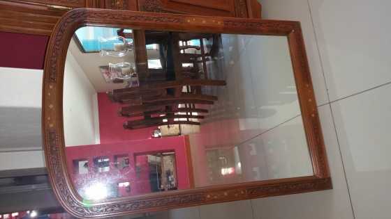 Hand carved brass embedded rosewood mirror