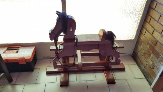 Hand crafted solid rosewood rocking horse