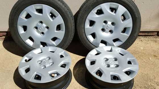 Hyundai i20 hubcaps and 15quotwheels with 2 tyres for sale