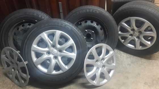 Hyundai wheels and tires for sale 1x100 PCD 17570R14 80 thread with original Accent caps