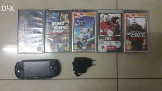 In box, Like brand new PSP Street with charger, memory card, pouch amp 5 original latest Games...