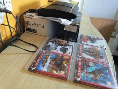 In box, Like brand new,  Superslimline Playstation 3 500gb with 5 Original Games amp 2 Controllers...