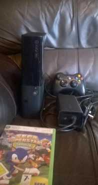 In great condition, Xbox 360 Limited Edition, Super Slimline with 1 Controller amp 1 Latest Game...