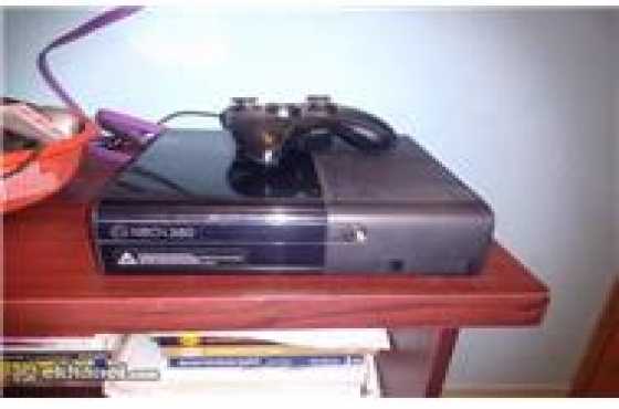 In Great Condition Xbox 360 Limited Edition, Super Slimline with 1 Controller amp 4 Original Games..