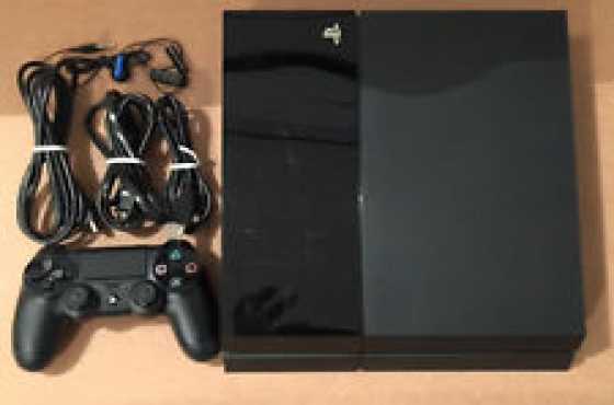 In mint condition, Black Playstation 4, 1000GB 1TB with 2 Wireless Controllers amp 2 Latest Games...