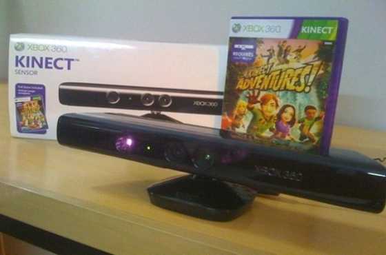 In mint condition Xbox 360 Kinect Sensor with Kinect Games for sale...