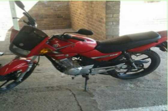 It is a Ybr125 Yamaha red bike. Registration no is CR99HM GP