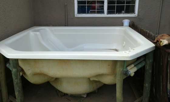 Jacuzzi with wooden frame