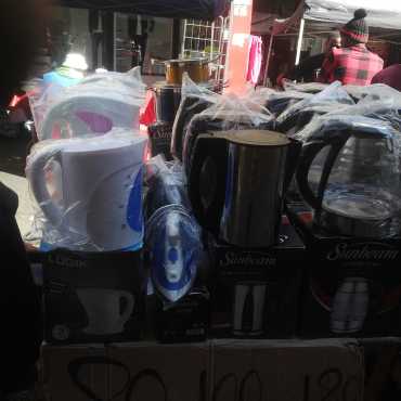 Kettles, laundry irons, heaters, fans, blenders for sale