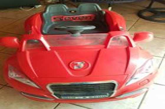 Kids 12v ride on car with charger and remote