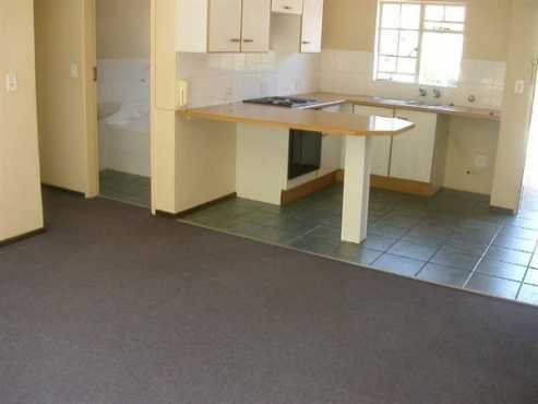 Kitchen cupboards with sink, taps and defy stove for sale.