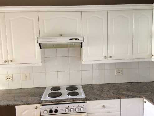 Kitchen units with hob, oven, extractor and granite tops