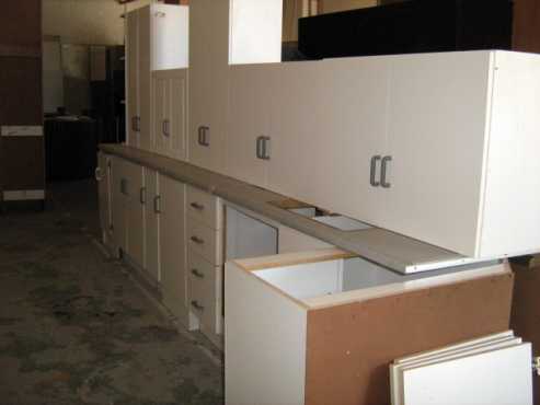 kitchen- White melamine with Stardust formica counters