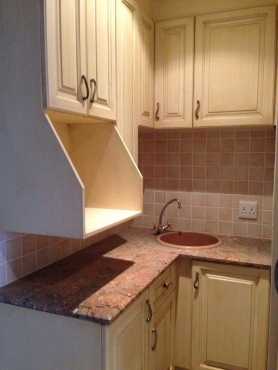 KITCHENETTE. SMALL KITCHEN. BARELY USED. GRANITE TOPS WITHGRANITE COMPOSITE PREP-BOWL