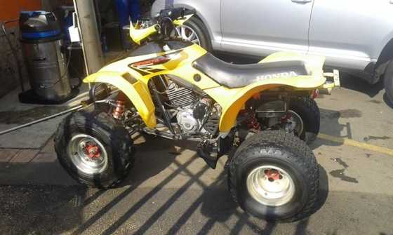 Lady owned Honda Sportrax 300