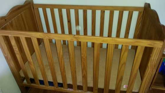 large wooden cot