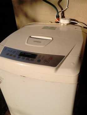 LG Fuzzy Logic top loader washing machine