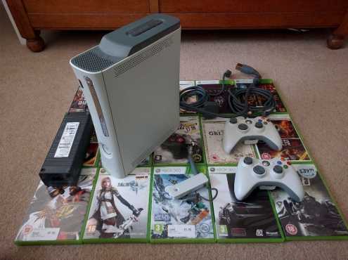 Like Brand-new Xbox 360 with 60gb HD with over 35 games disks amp 2 rechargeable wireless controllers