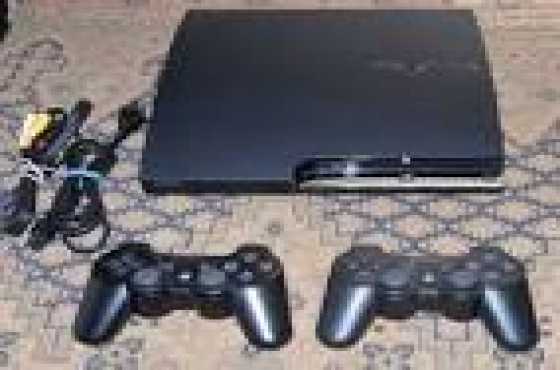 Like New Playstation 3, with 320gb hard-drive, 5 Latest games amp 2 wireless controllers for sale...