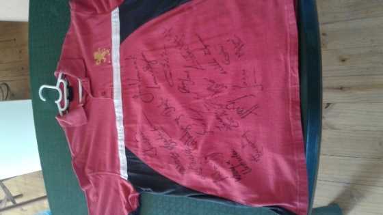 LIons team signatures on supporters shirt