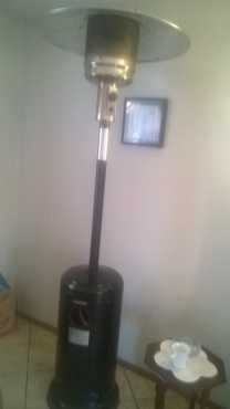 Logik Patio Heater with gas bottle (9kg) for sale - R 2000.00, as new.  Without gas bottle R 1300.00