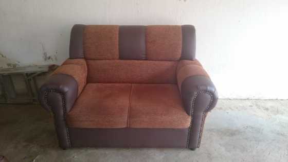 Lounge set 1 double and 2 single seat like new semi leather on sides and material on seat