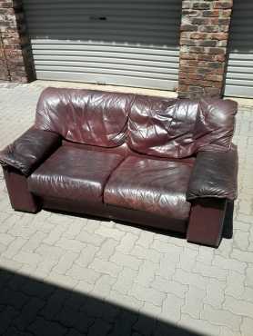 Lounge Suite leather couch, maroon. 2 seater for sale