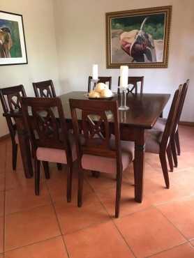 Mahogany diningroom table with 8 chairs