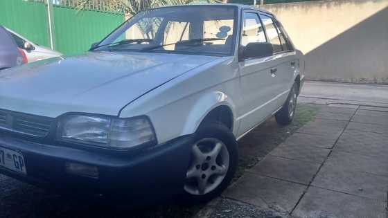 Mazda 323, 2003  still very good and light on fuel  R24500   0820520428    0842535793