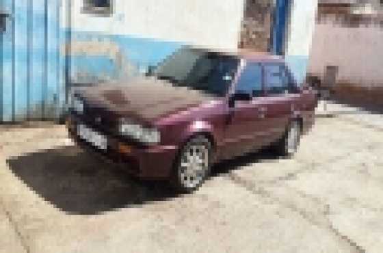 mazda 323 sedan very clean