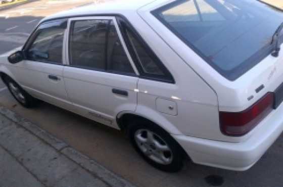 mazda 323 sting model 2002