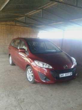 Mazda 5 . 2 liter . 6 spoed