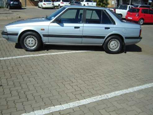 Mazda 626 AT.