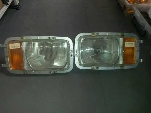 Mercedes Benz 124 head lamps new set