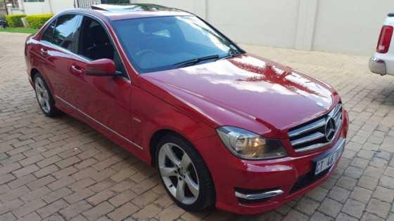 MERCEDES BENZ C180 AVANTGARDE AT, AMG TOUCHSHIFT 7G-TRONIC GBOX amp STYLING, SEDAN. RED. 88250KMS